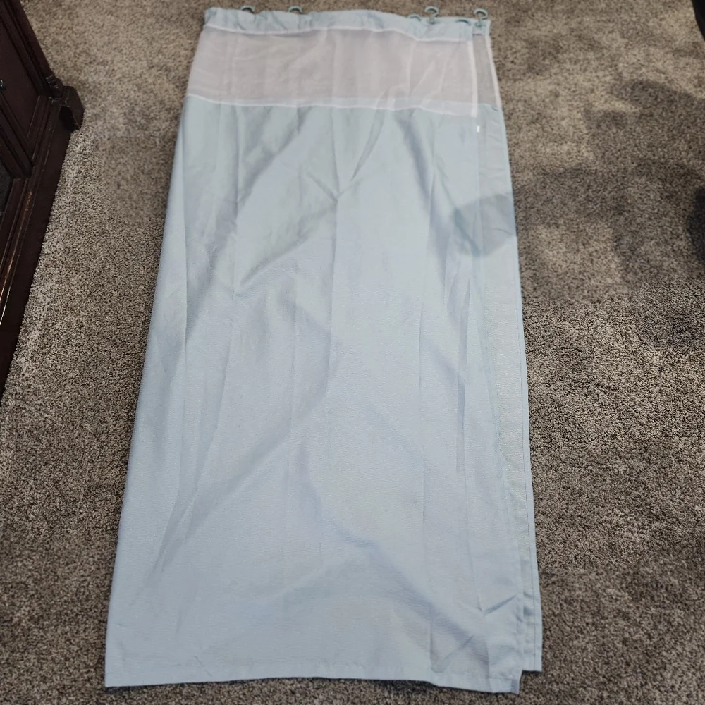 Light Green Shower Curtain With Rod Hooks Attached..